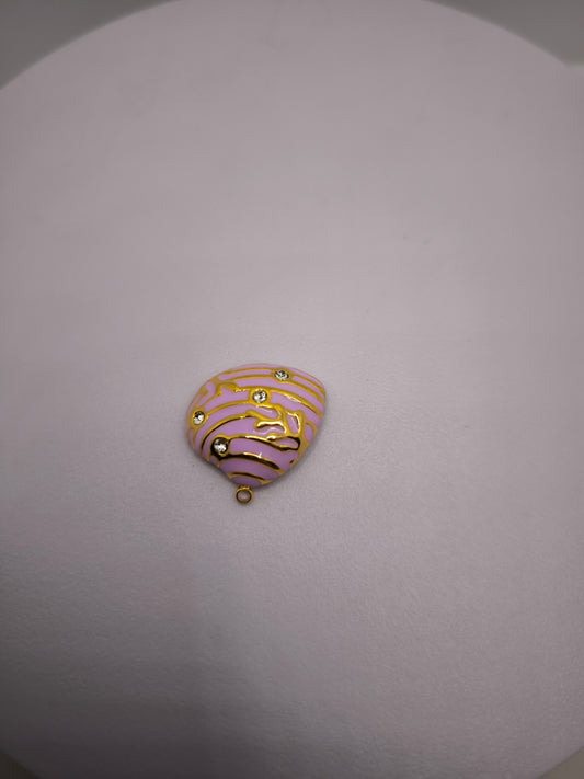 Coquillage doré et violet