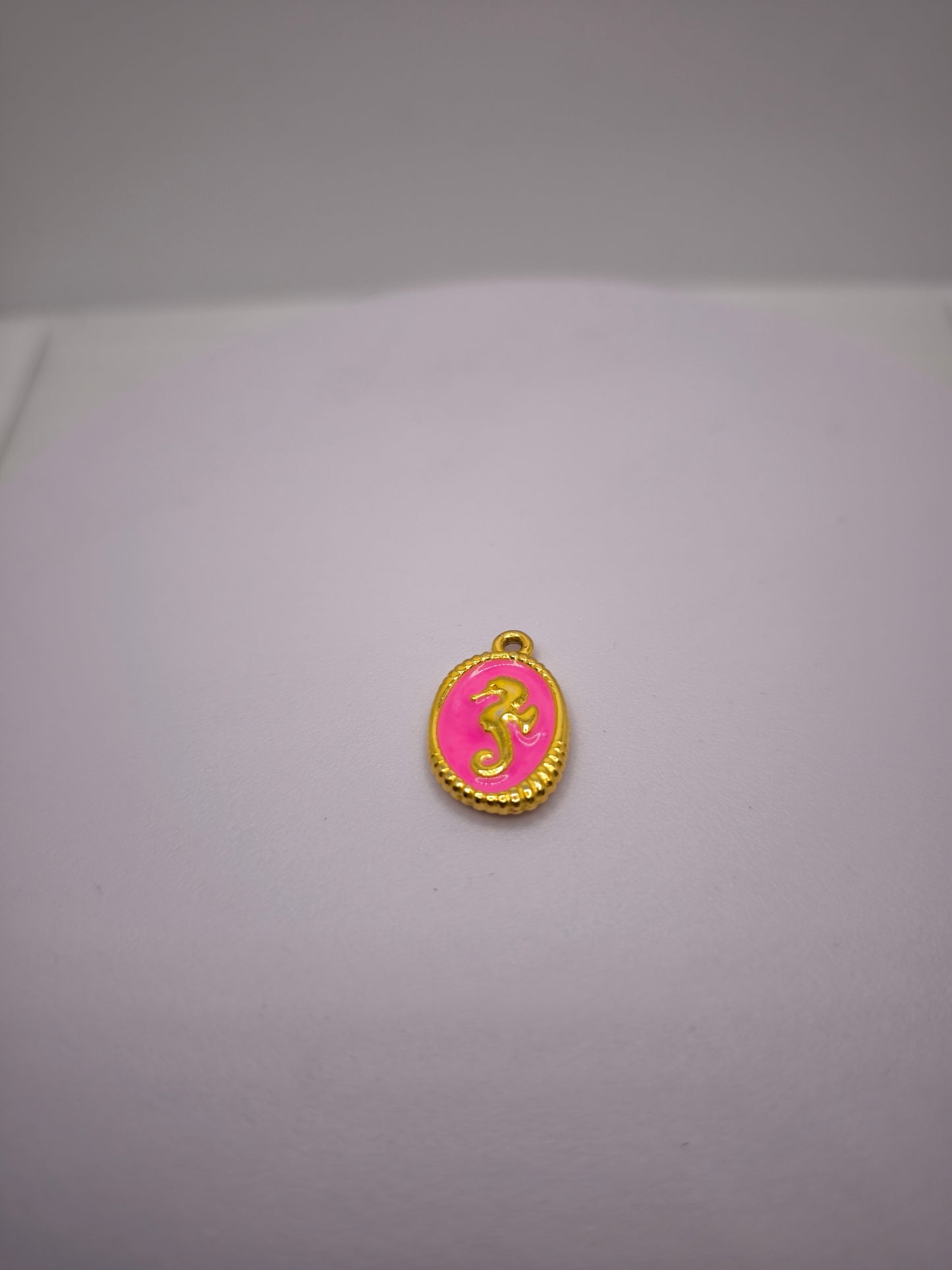 Hippocampe rose fluo